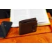 Коричневе чоловіче портмоне з натуральної шкіри з фіксацією ST Leather ST103