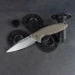 Ніж складаний туристичний Ruike P843-W, Sandvik 14C28N, G10, коричневий
